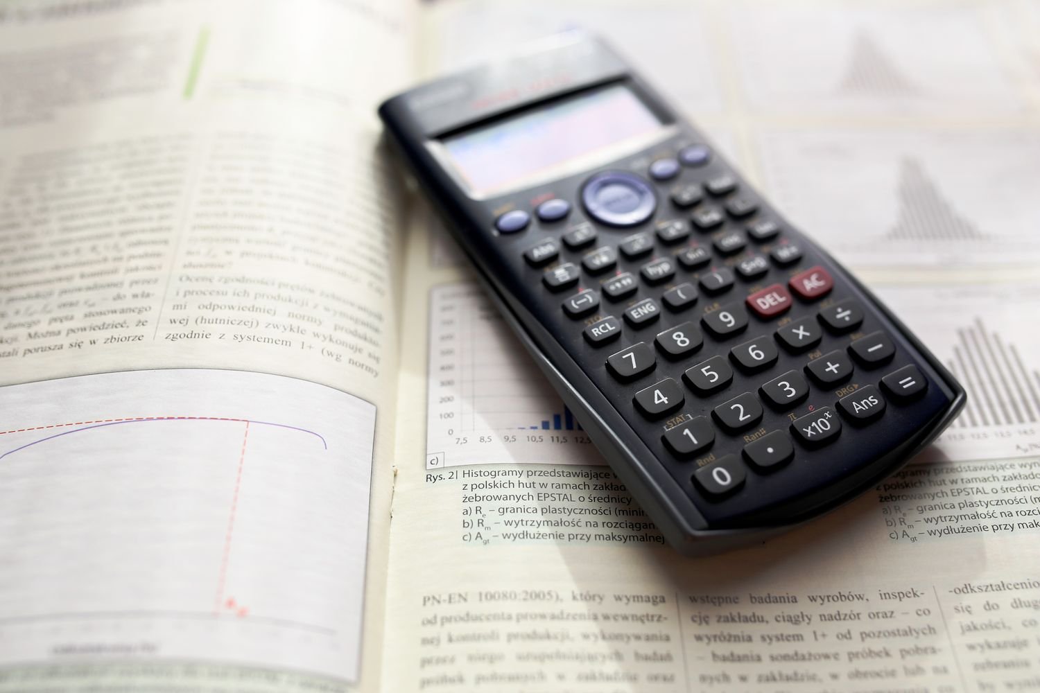 Scientific calculator on a desk, representing ICAG accounting exam revision